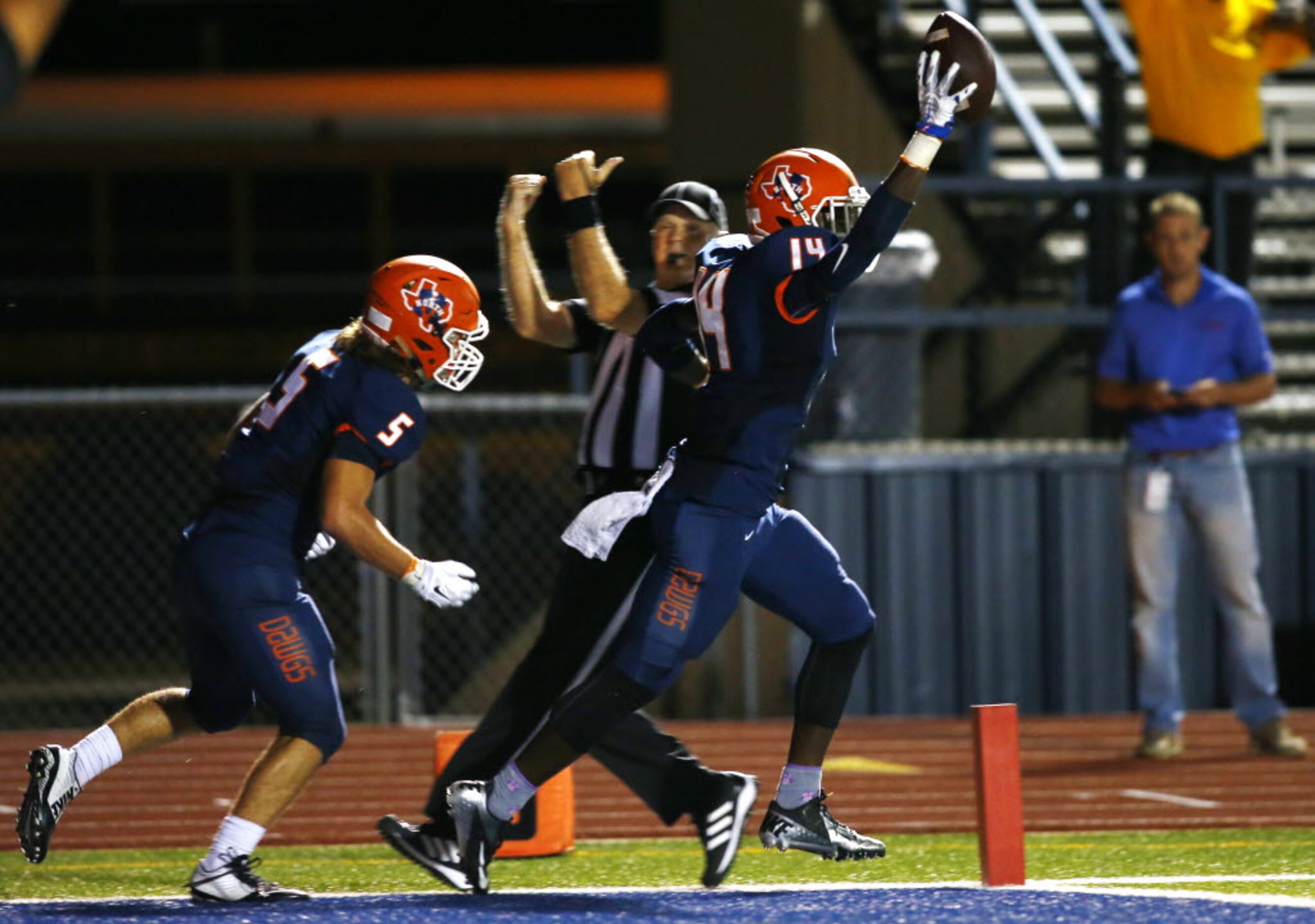 TXHSFB McKinney North defensive back Jamarrius Hill (14) and defensive back Ruston Travis...