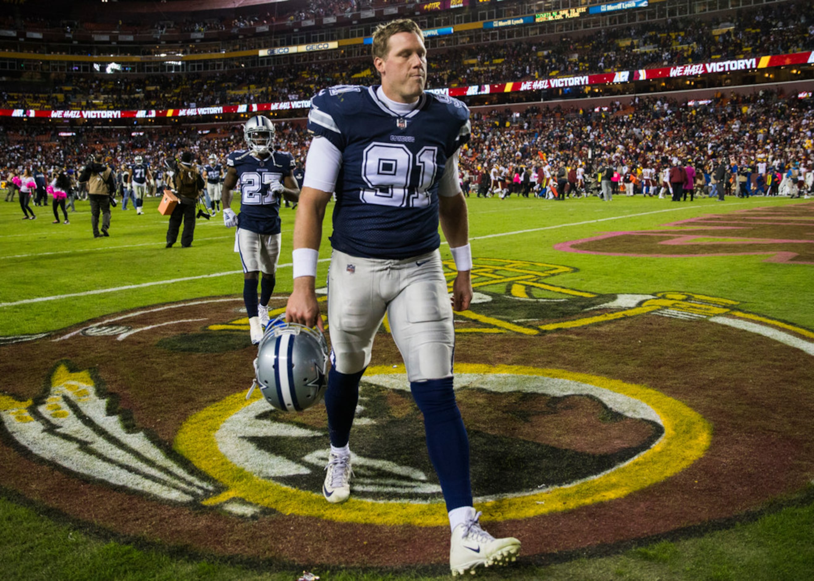 Dallas Cowboys long snapper L.P. LaDouceur (91) stretches during