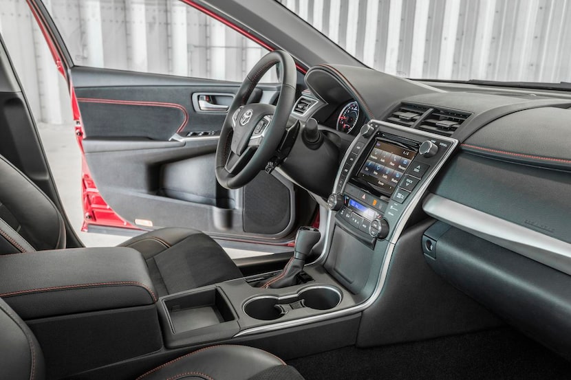 The 2015 Toyota Camry XSE’s  upgraded interior includes a big, flat dash that features...