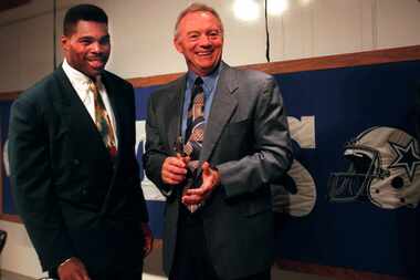 7/11/96--Dallas Cowboys' owner Jerry Jones ( right) smiles as he chats with new Cowboy...