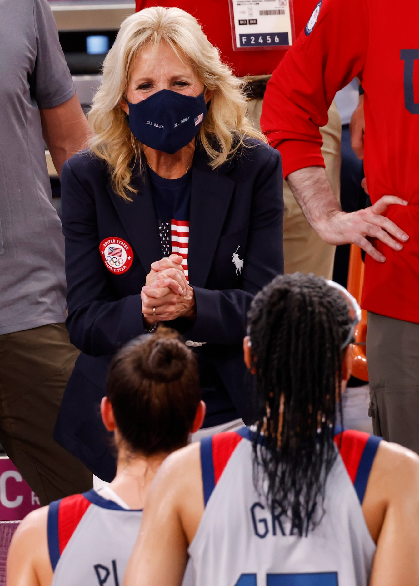 First lady Jill Biden talks with USA’s Jacquelyn Young (8), Kelsey Plum (5), Allisha Gray...