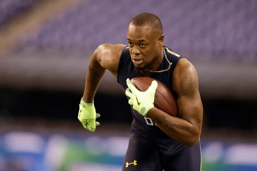 Florida State defensive back Marquez White runs a drill at the NFL football scouting combine...