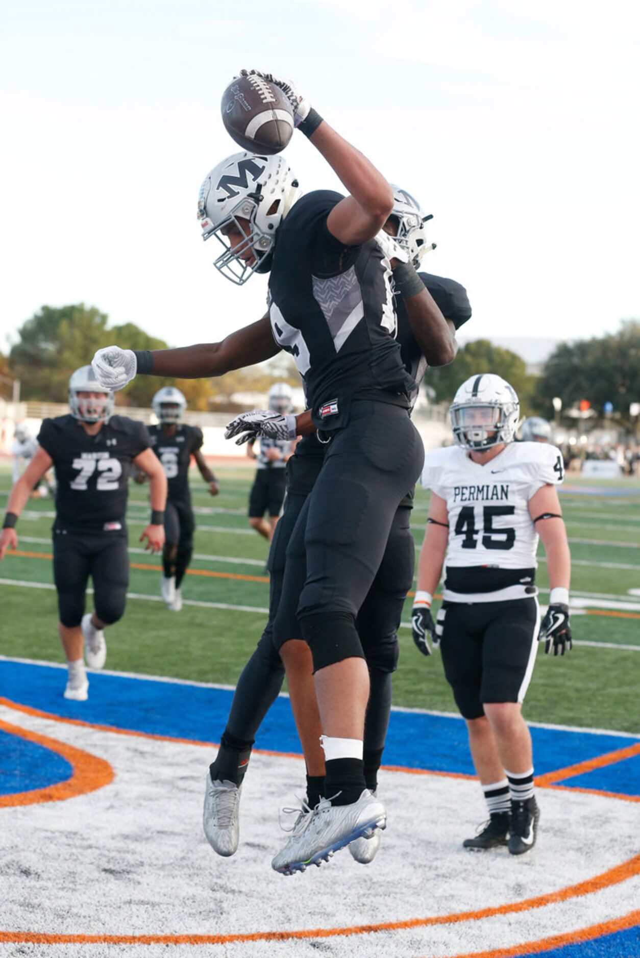 Arlington Martin receiver Sorrell Brown (19)  celebrates a touchdown against Odessa Permina...