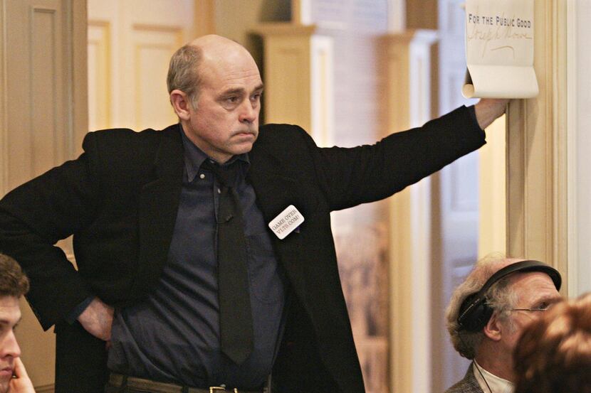 In this April 12, 2005 photo, actor John Dunsworth listens to a speaker at a news conference...