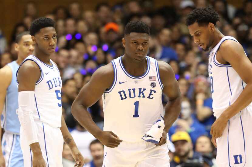 DURHAM, NORTH CAROLINA - FEBRUARY 20: Teammates RJ Barrett #5 and Marques Bolden #20 of the...