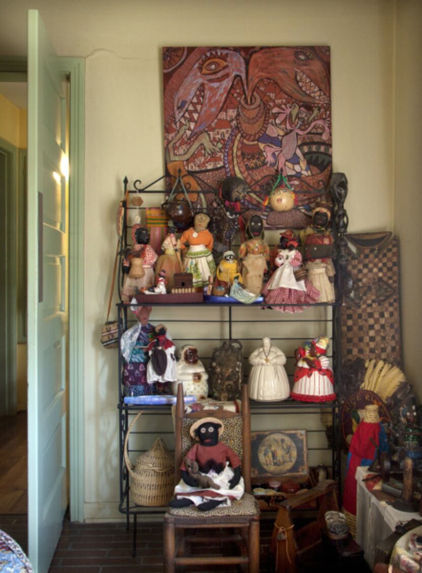 Black memorabilia with a painting by Yoruba artist Twins Seven Seven from Nigeria in the...