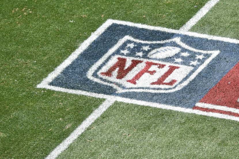 A general view of the painted NFL logo during the first half of an NFL football game between...