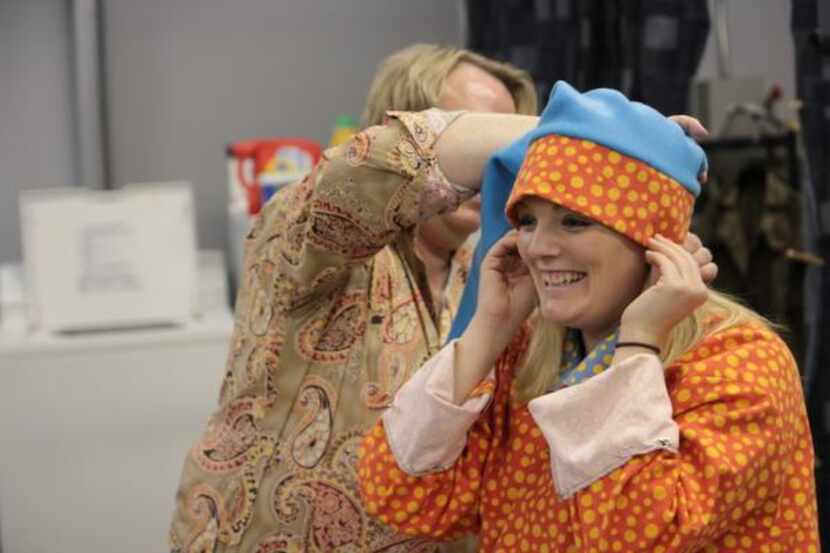 
Steph Garrett has a costume fitting before rehearsing for the Dallas Children’s Theater’s...