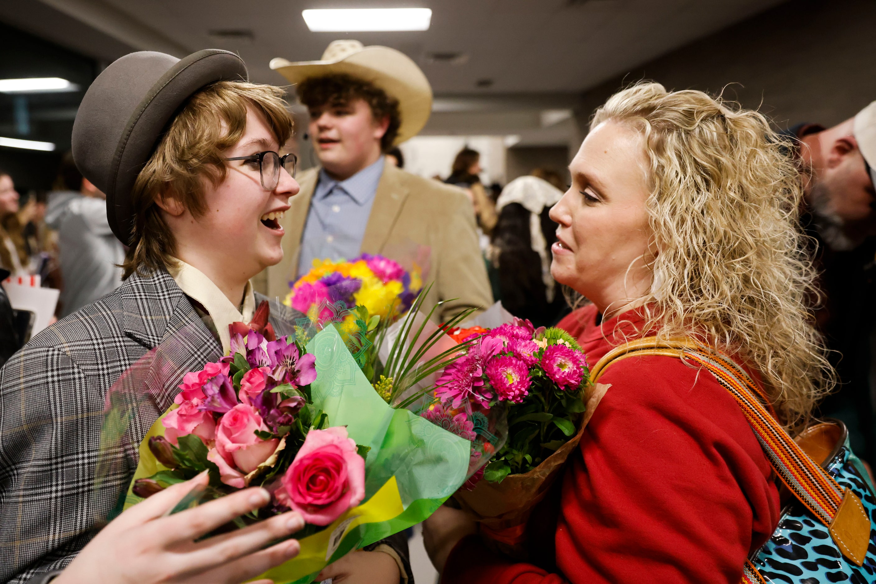 Cast member Max Hightower (left) cheers towards her mother Amy Hightower following his...