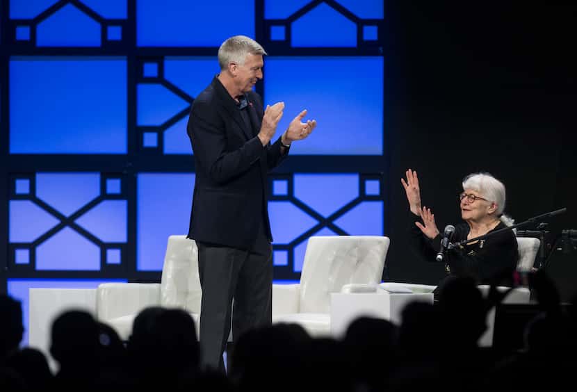 Southwest Airlines president emerita Colleen Barrett (right) tried to calm an applauding...