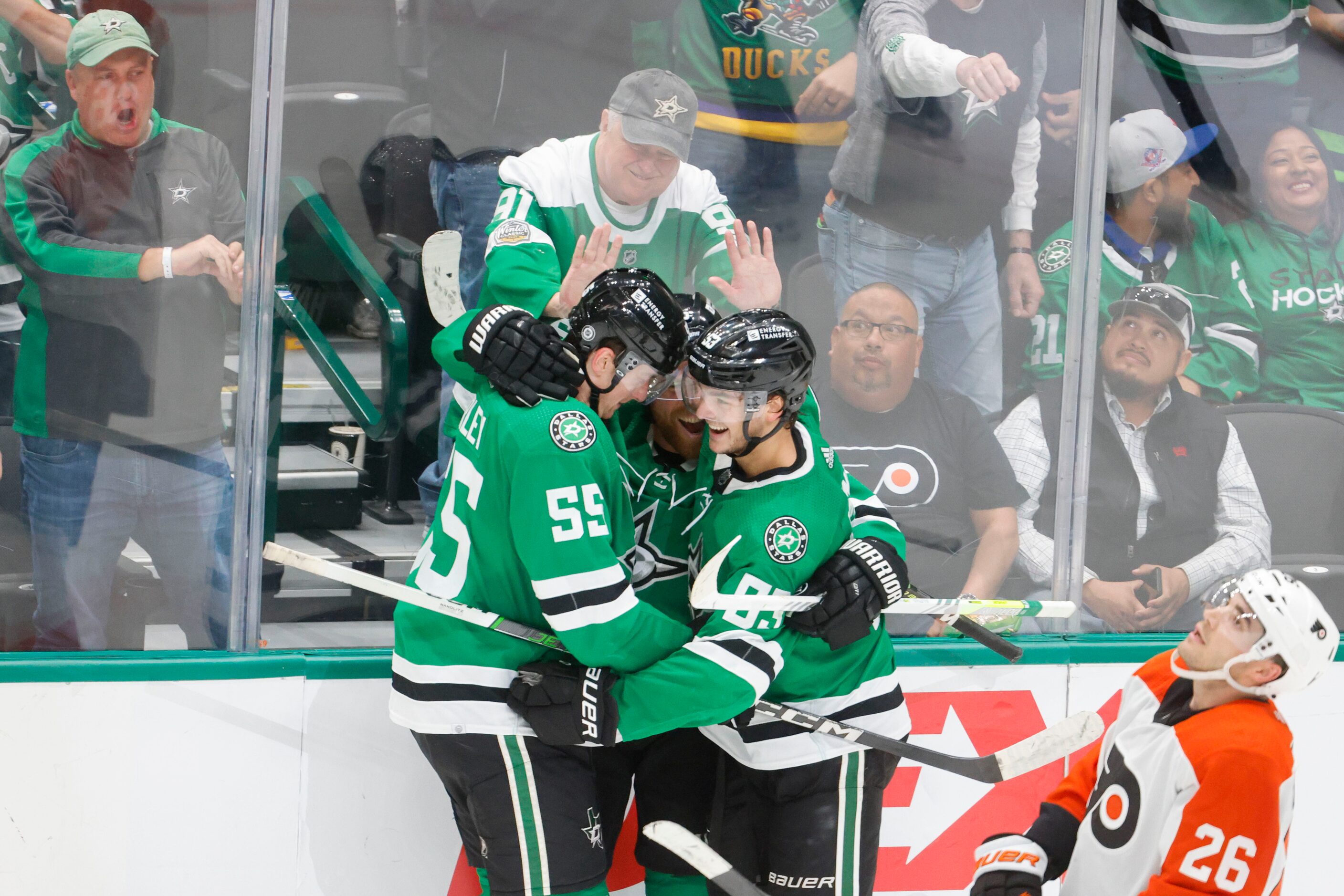 Dallas Stars center Joe Pavelski (center) celebrates his overtime goal with defenseman...