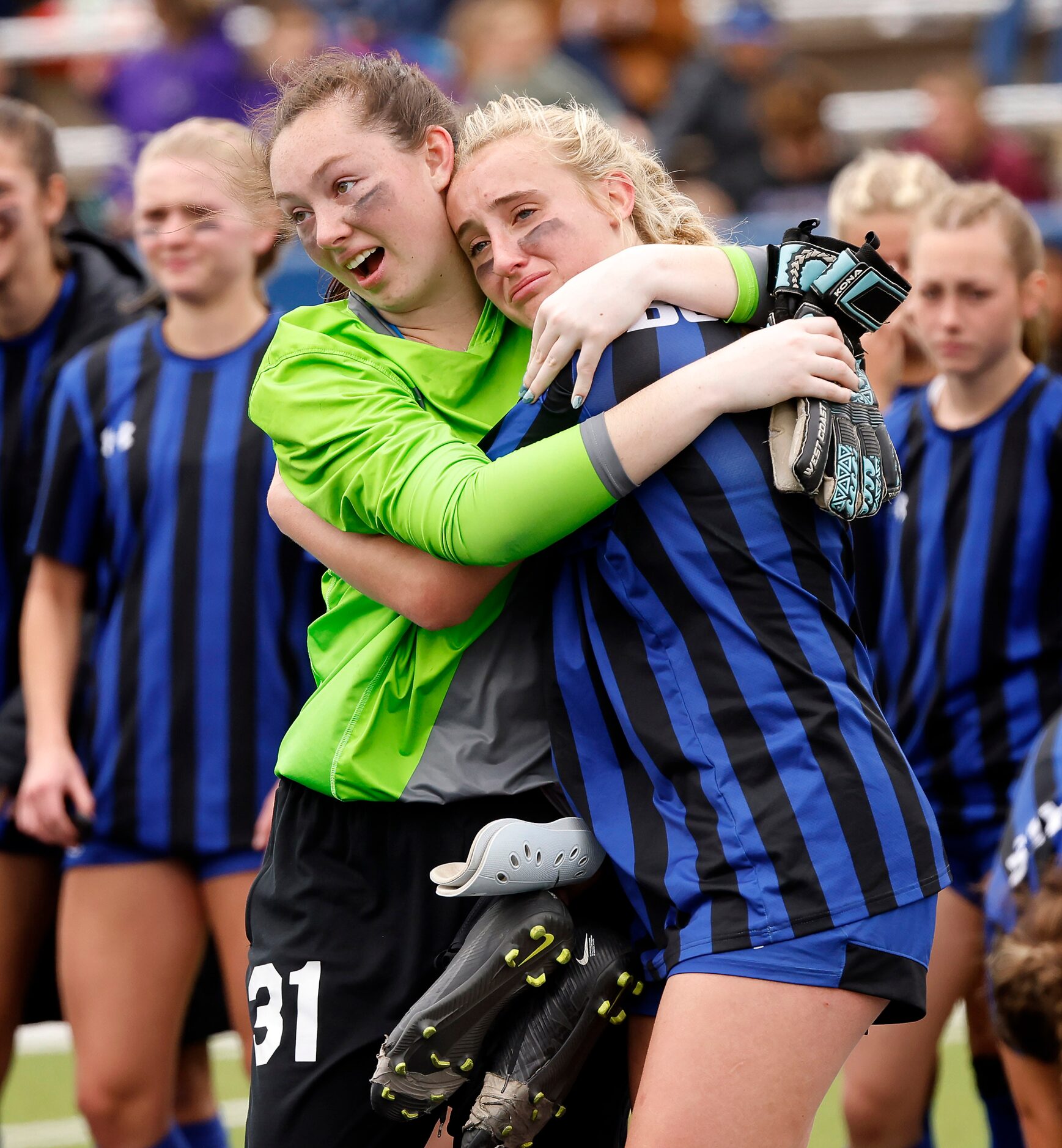 Trophy Club Byron Nelson senior goal keeper Raelyn Stone (left) consoles senior teammate...