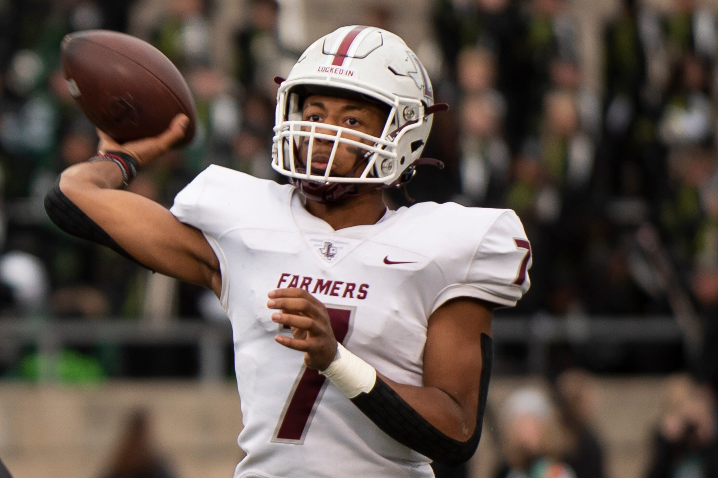 Lewisville sophomore Ethan Terrell (7) throws the ball to an open teammate during the Class...