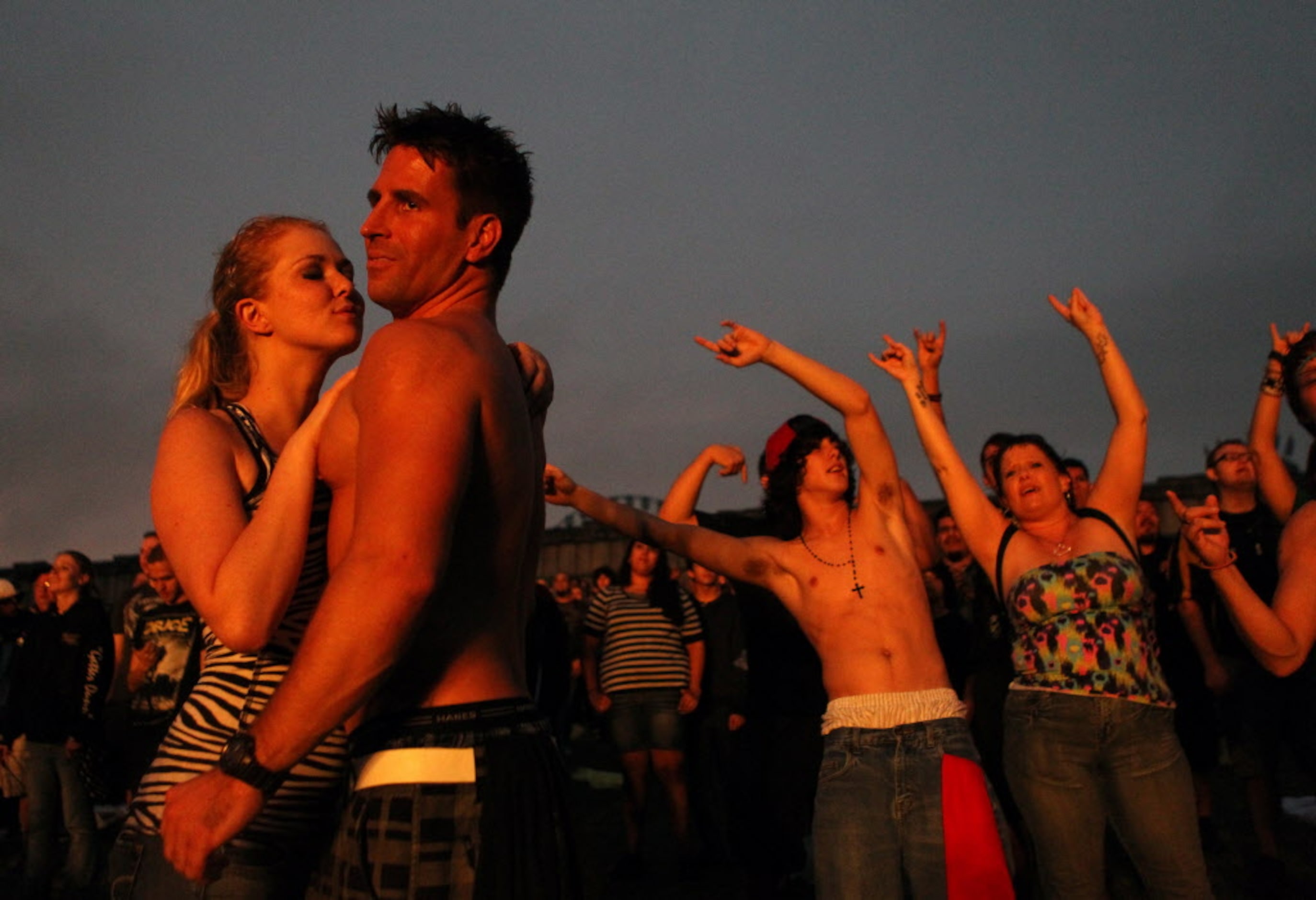 Monika Thomas and Sterling Hudson of Carrollton watch the band Staind during the Uproar...