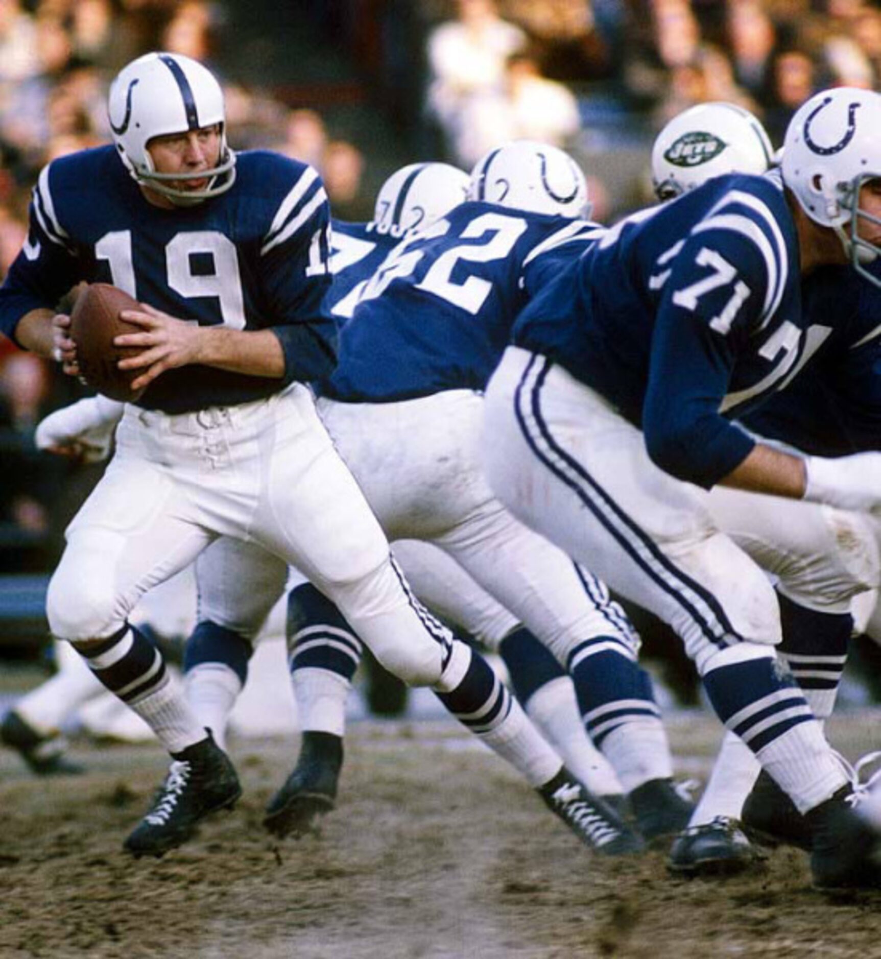 18. Johnny Unitas takes field in fourth quarter:

Unitas is the father of the two-minute...