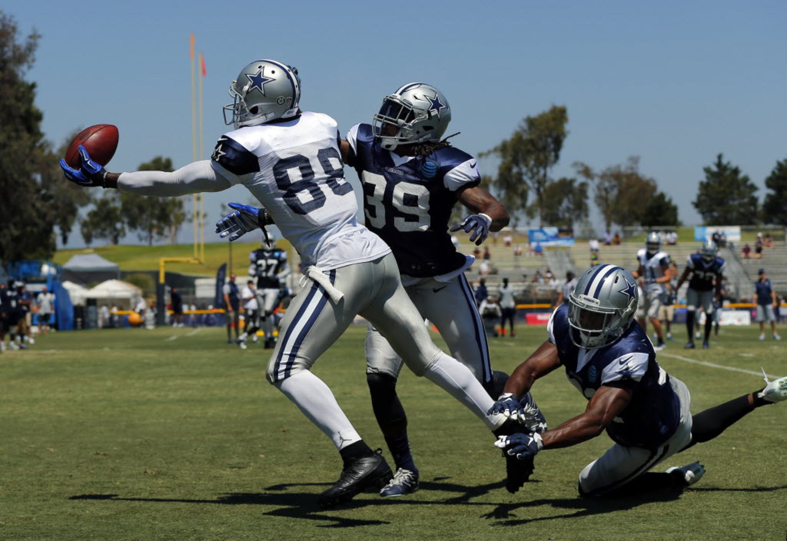 Injured Dallas Cowboys wide receiver Dez Bryant roams the sidelines during  an NFL football game against the San Francisco 49ers Sunday, Oct. 2, 2016,  in Santa Clara, CA. The Cowboys won 24-17. (