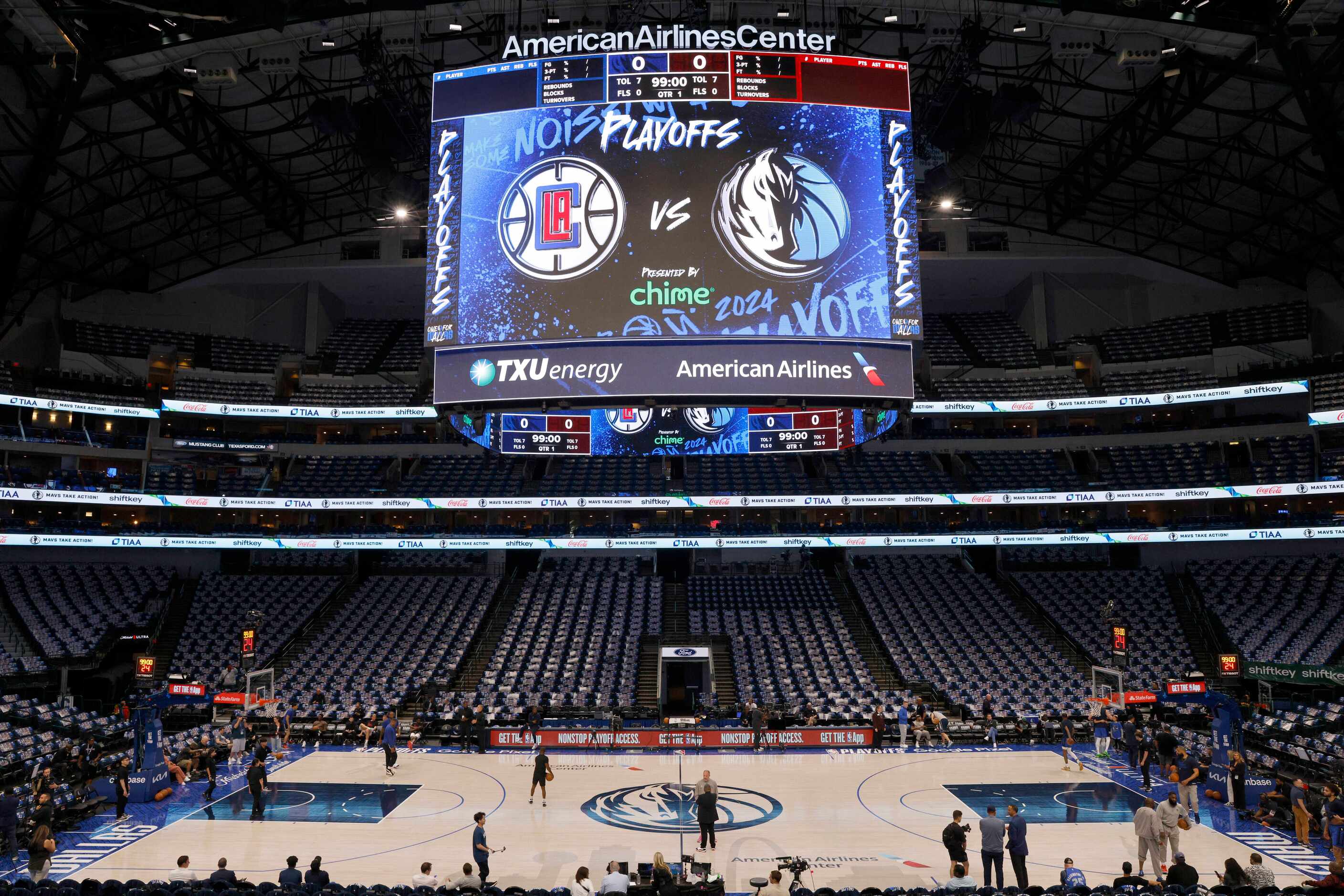 Players from the Dallas Mavericks and Los Angeles Clippers warmup before before Game 3 of an...