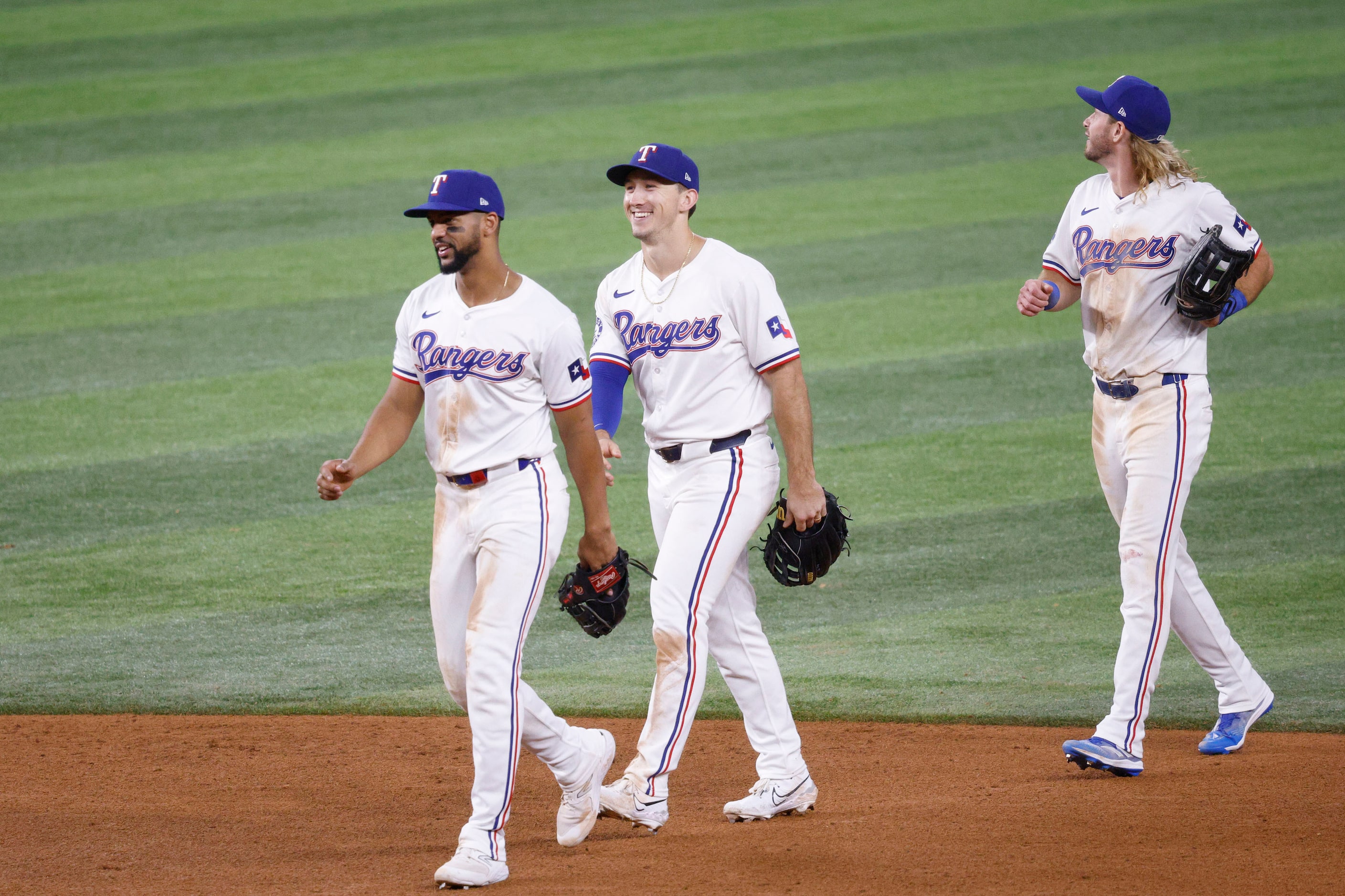 Texas Rangers outfielder Leody Taveras (3), from left, Texas Rangers outfielder Wyatt...