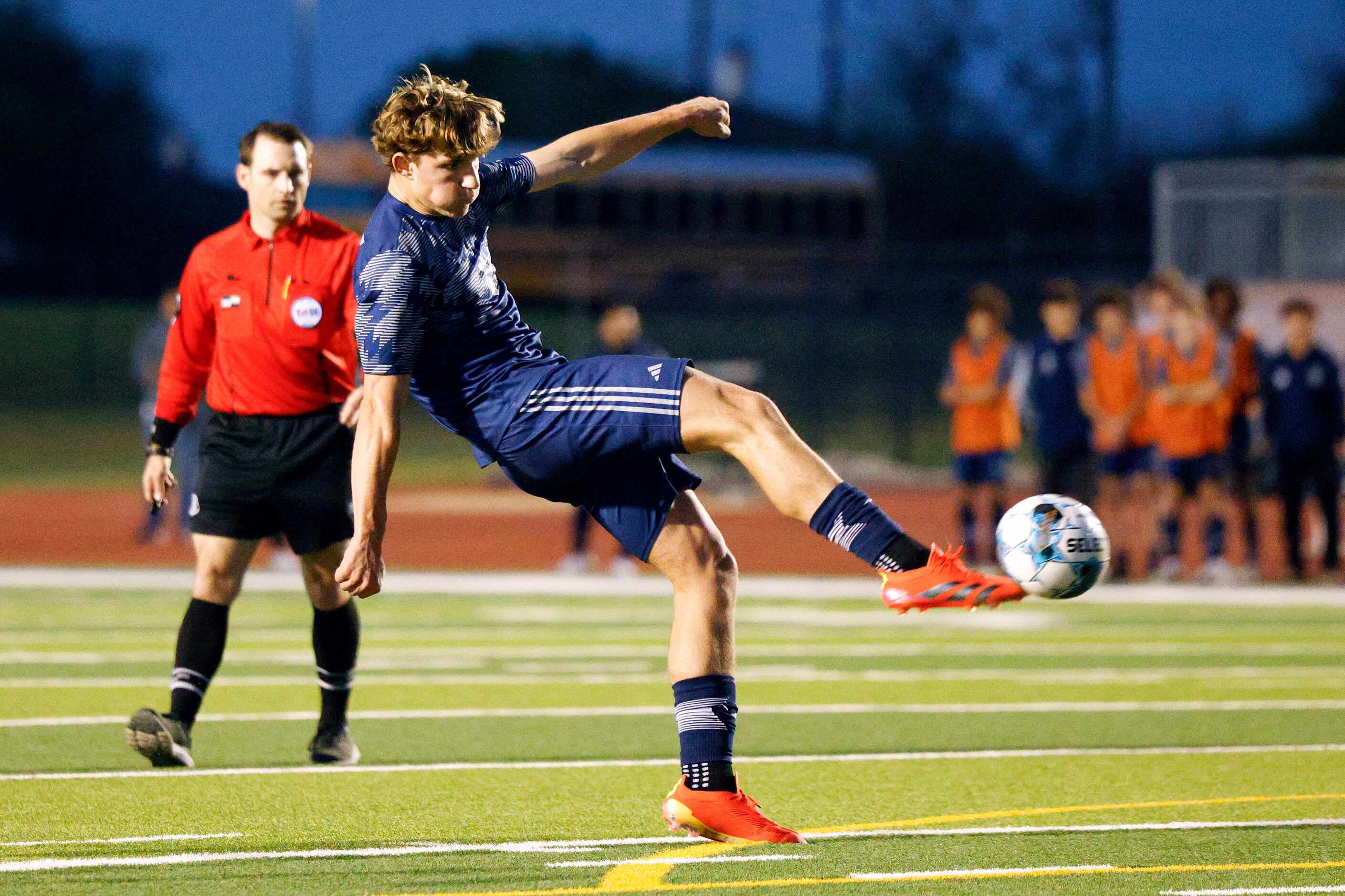 Prosper Walnut Grove forward Ryan Anderson (9) shoots the ball towards goal during the first...