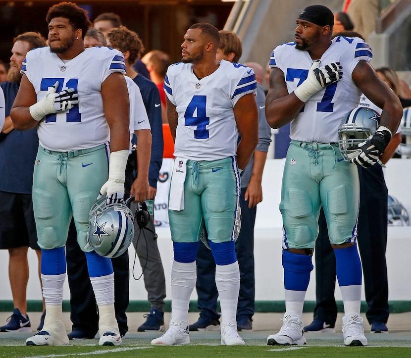 From left, Dallas Cowboys offensive tackle La'el Collins (71), quarterback Dak Prescott (4)...