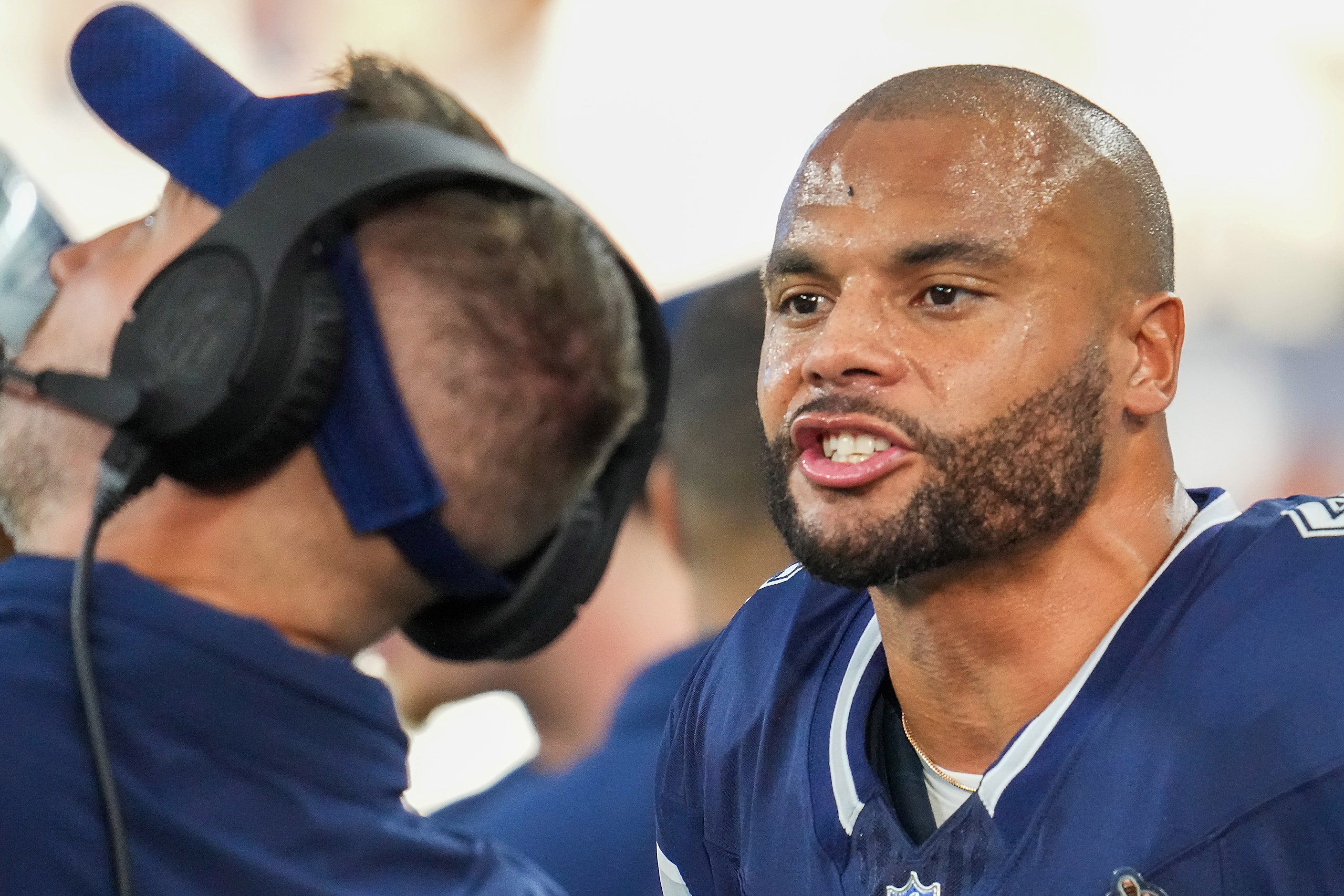 Dallas Cowboys quarterback Dak Prescott yells toward offensive coordinator Brian...