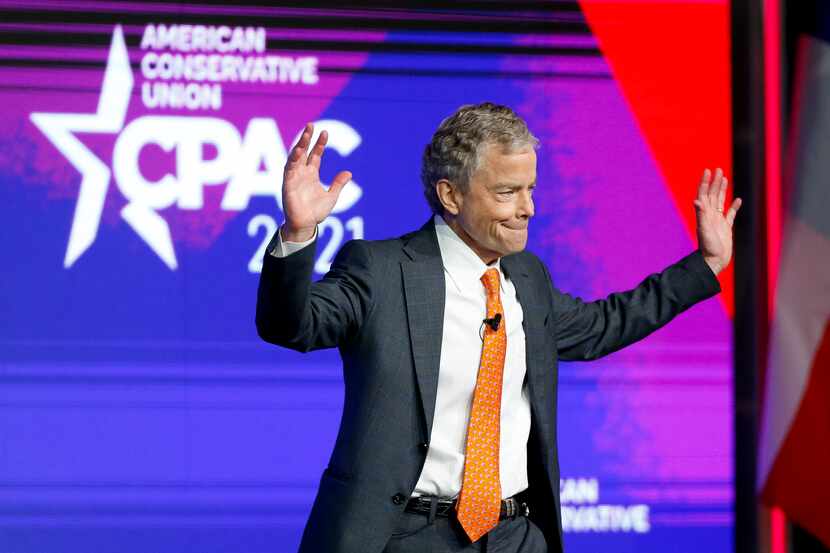 Former Texas state Sen. Don Huffines waves to the crowd before speaking at the Conservative...