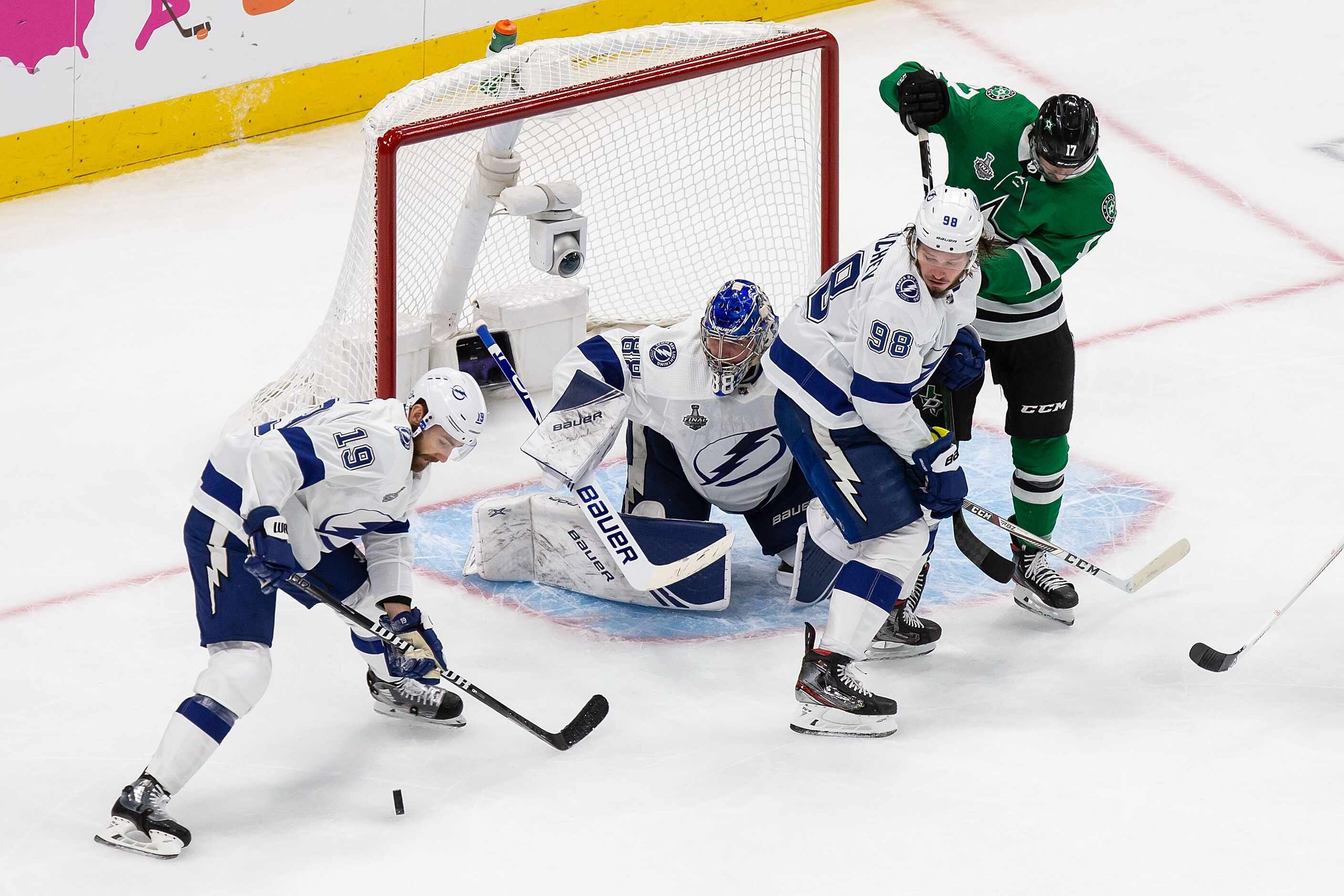 Nick Caamano (17) of the Dallas Stars can't score as Barclay Goodrow (19), goaltender Andrei...