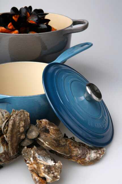 Le Creuset dutch oven in Oyster and saucepan in Marine. (Rose Baca/The Dallas Morning News)