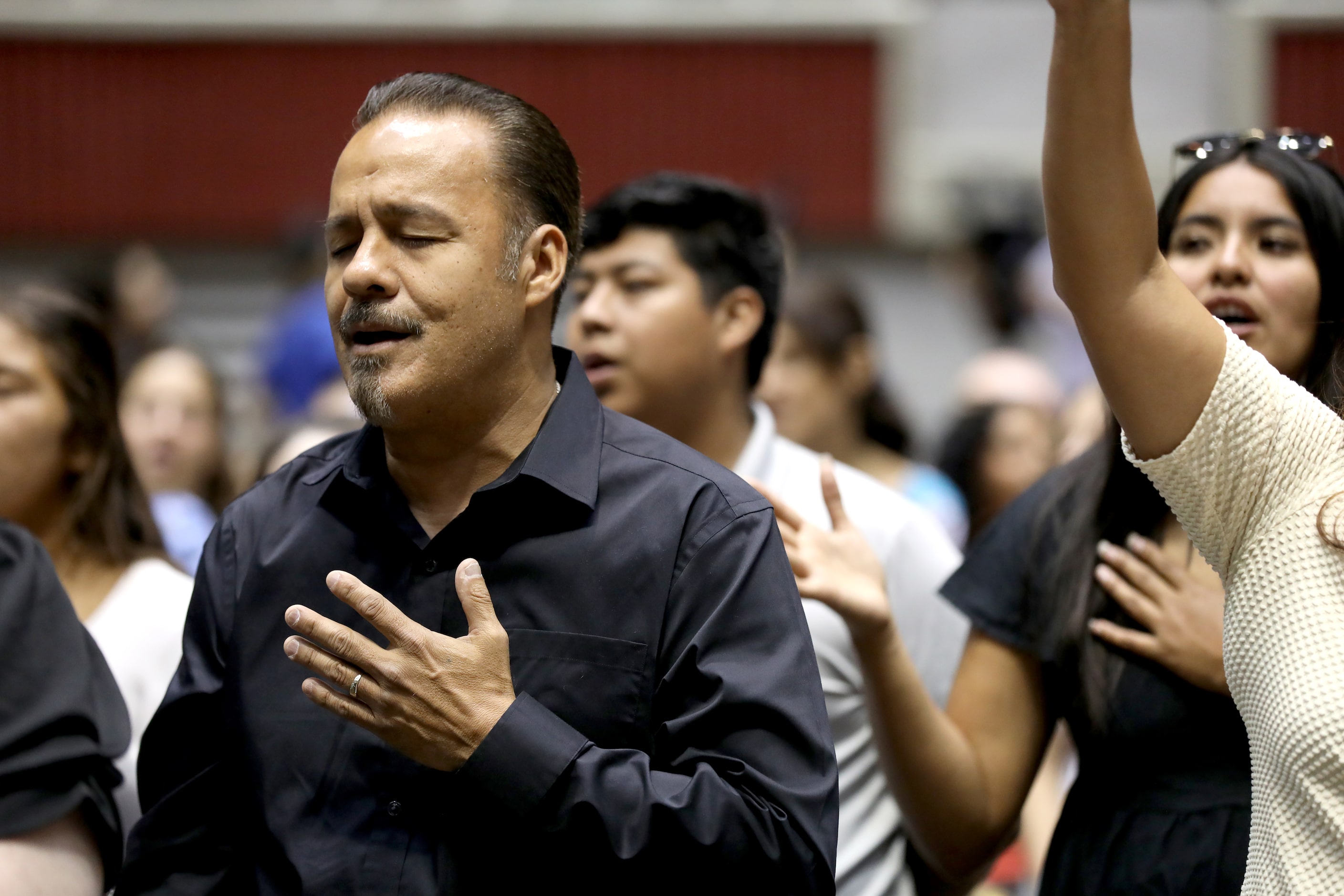 First Baptist Church members participate in Sunday service held at the Dallas Convention...