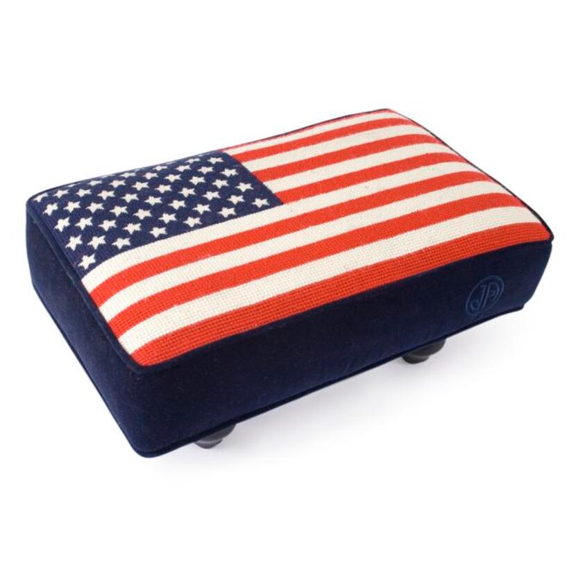 
True colors: The Grand Old Flag is always on display with a needlepoint footstool. $325 at...