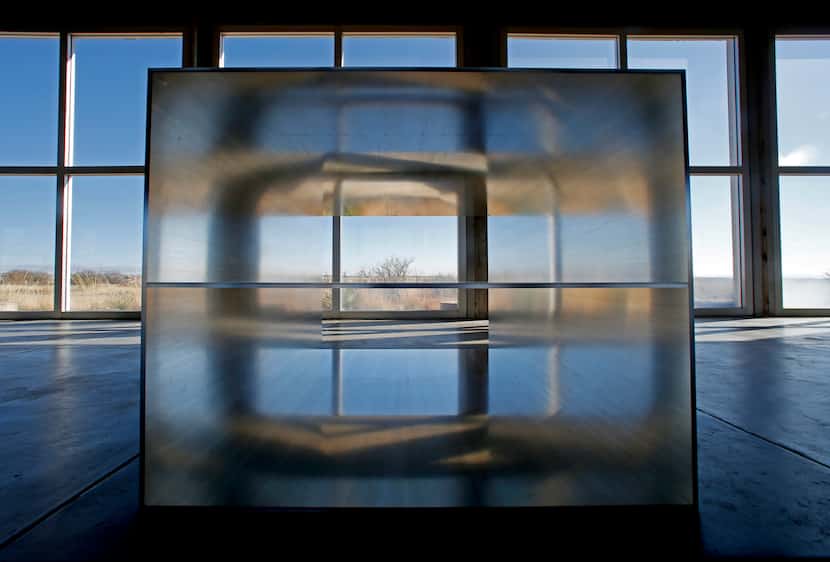 The southwest Texas landscape is seen through one of the pieces in Donald Judd's 100...