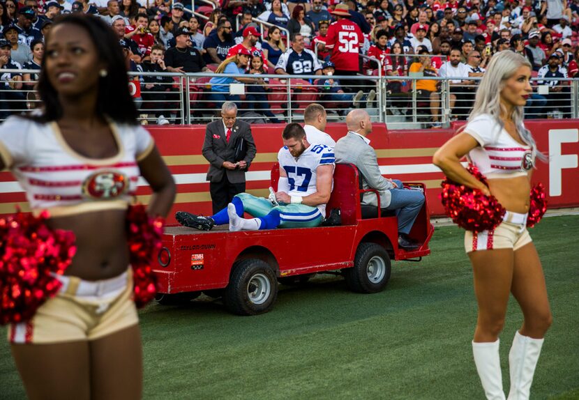 Dallas Cowboys linebacker Luke Gifford (57) is carted off the field after an injury during...