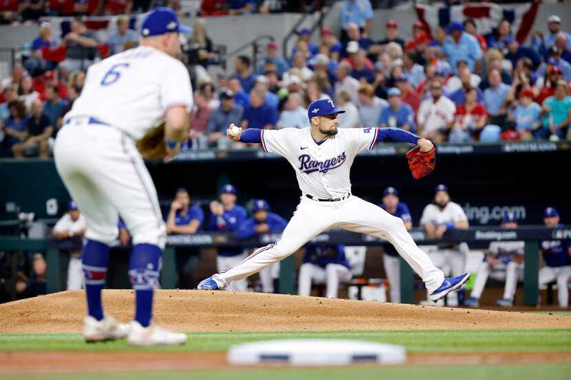 Texas Rangers starting pitcher Nathan Eovaldi (17) pitches in the second inning as the...