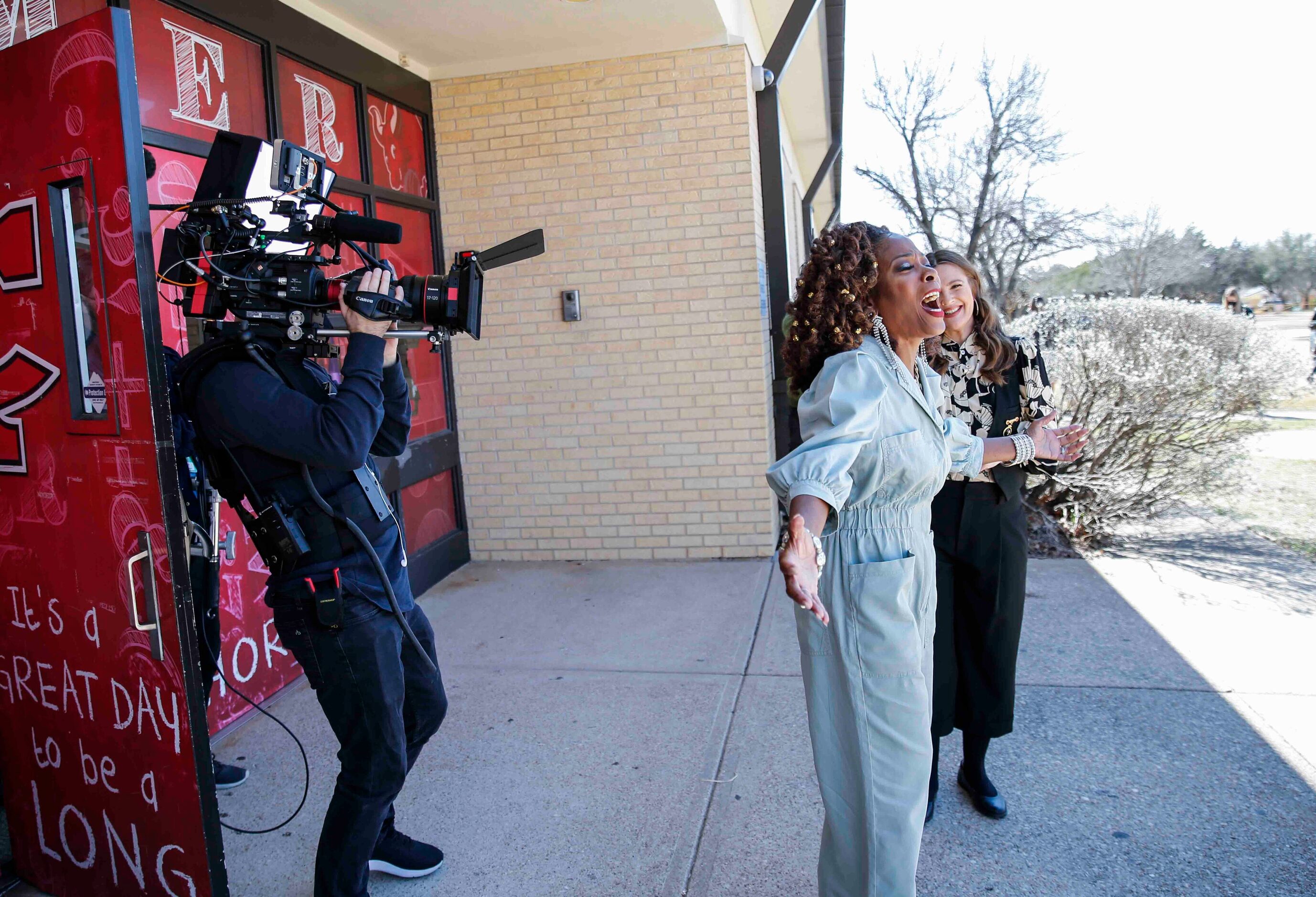 Patricia Byrd, front reacts towards her family members as Drew Barrymore watches during the...