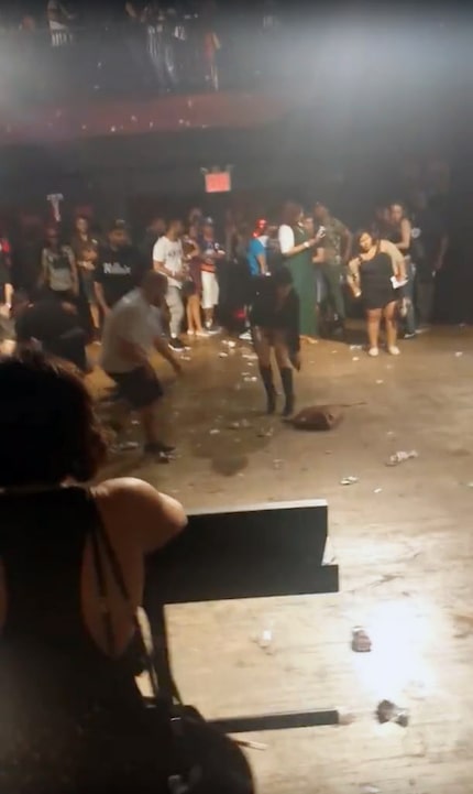  This image made from a video shows people inside Irving Plaza, near Manhattan's Union...