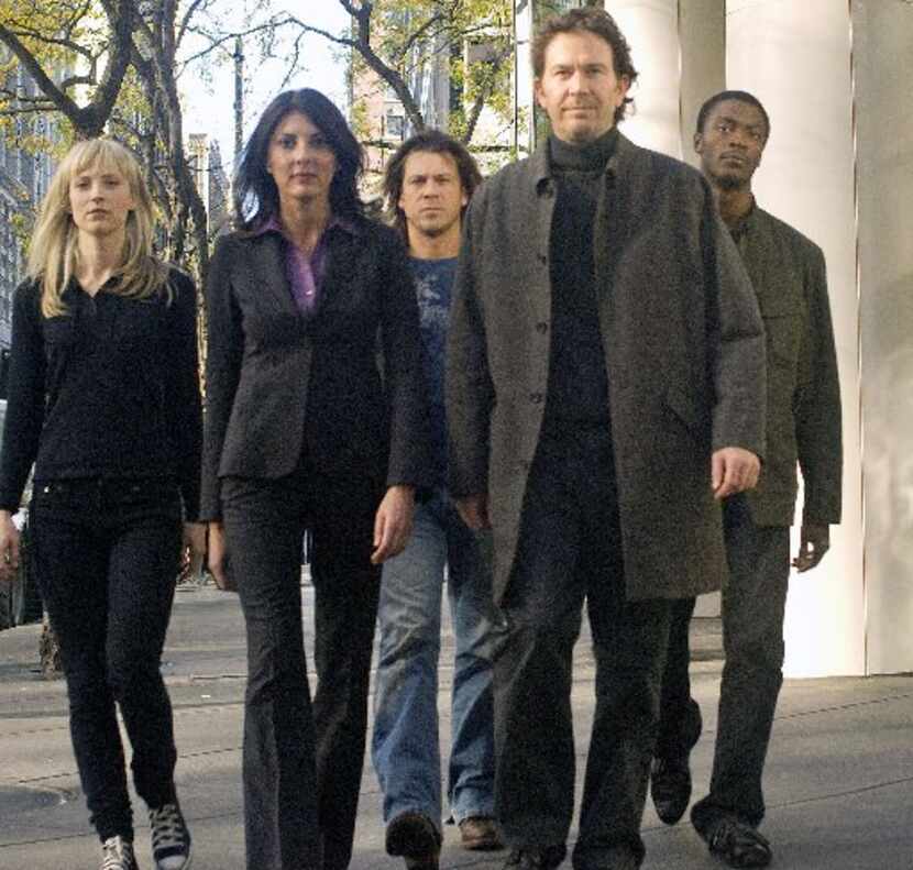 Timothy Hutton, second from right, stars in TNT's Leverage about a group of con men setting...