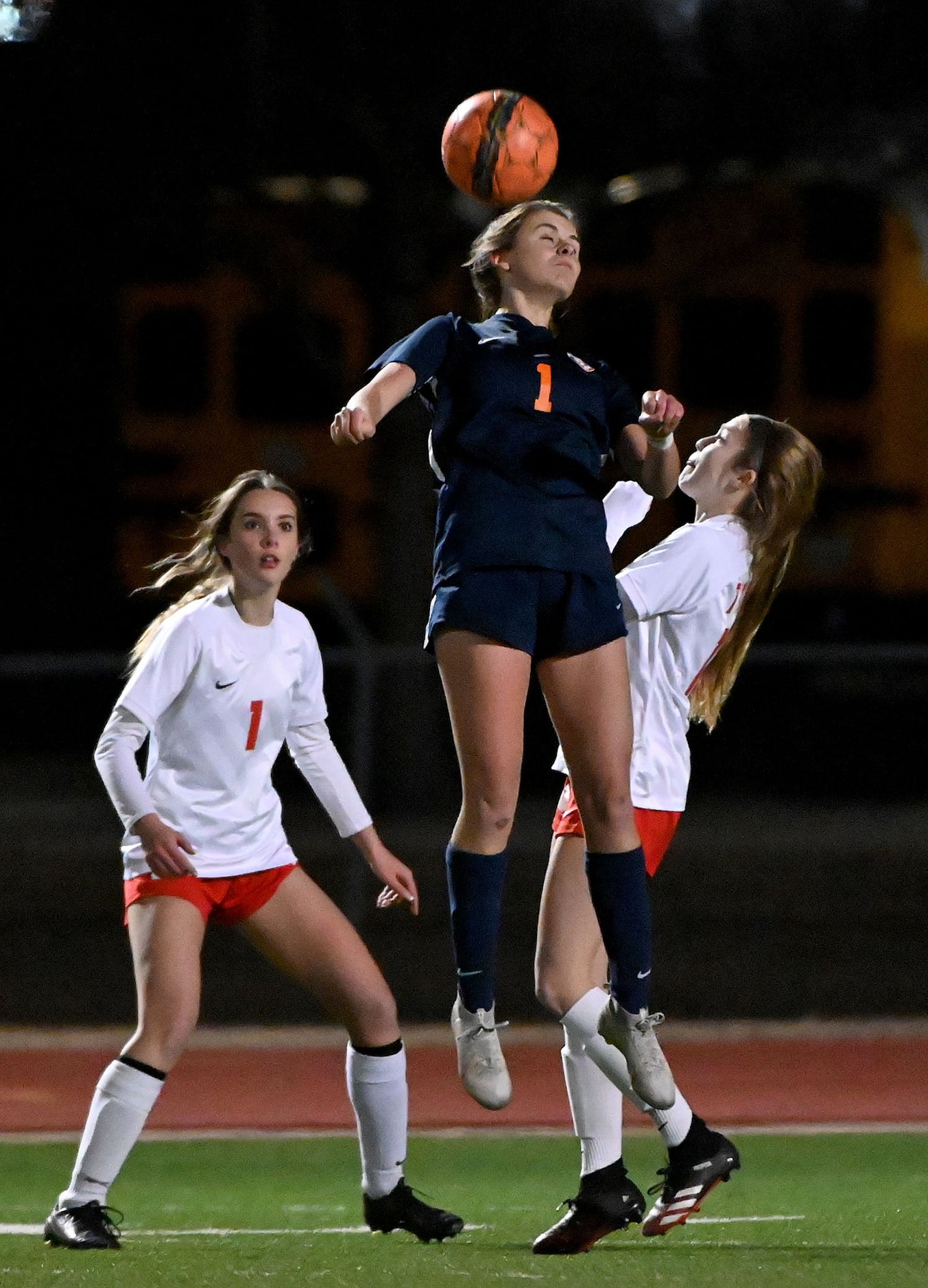 Frisco Wakeland Cori Cochran (1) gets to a header during a girls soccer game between Frisco...