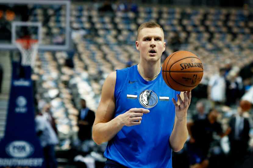 FILE - In this April 3, 2019, file photo, Dallas Mavericks forward Kristaps Porzingis...