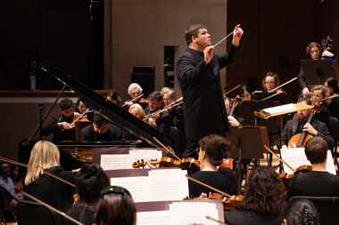 Guest conductor Andris Poga leads the Dallas Symphony Orchestra, with pianist Behzod...