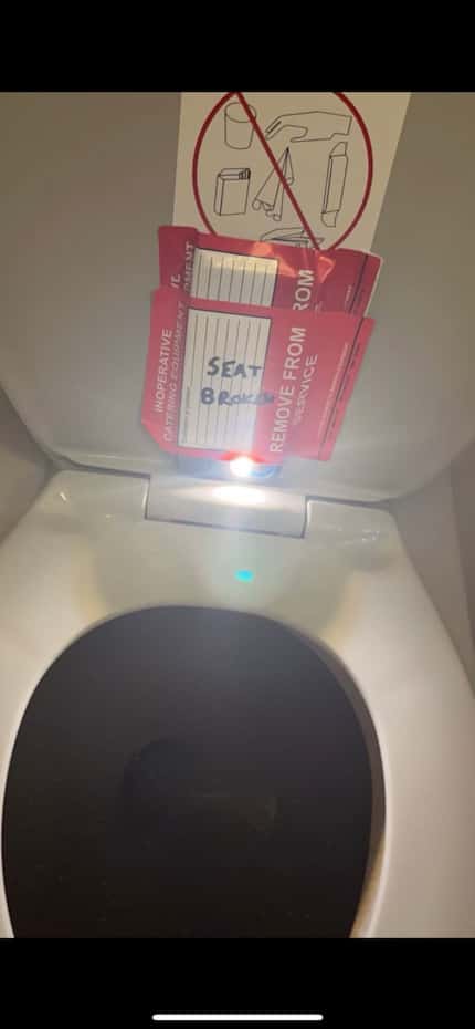 A photo of a camera hidden in the bathroom of an American Airlines plane.
