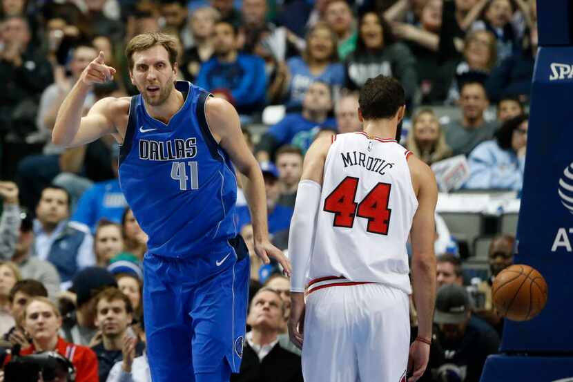 Dallas Mavericks forward Dirk Nowitzki (41) reacts after making a basket in front of Chicago...