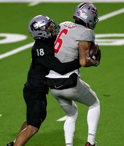 Flower Mound Marcus wide receiver Ashton Cozart (6) hauls in a reception against Denton...