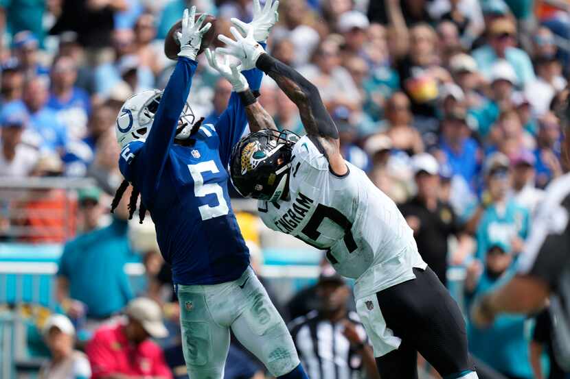 Indianapolis Colts cornerback Stephon Gilmore (5) tries to intercept a pass to Jacksonville...