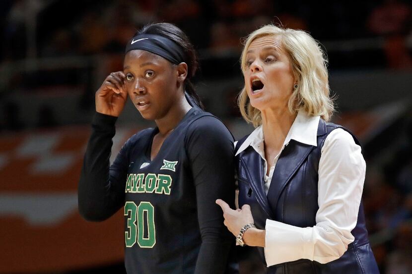 Baylor head coach Kim Mulkey, right, yells to her players as guard Alexis Jones (30) stands...