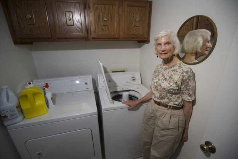 Eileen Brown of Arlington has rearranged her routine, waiting until 10 p.m. to do chores...