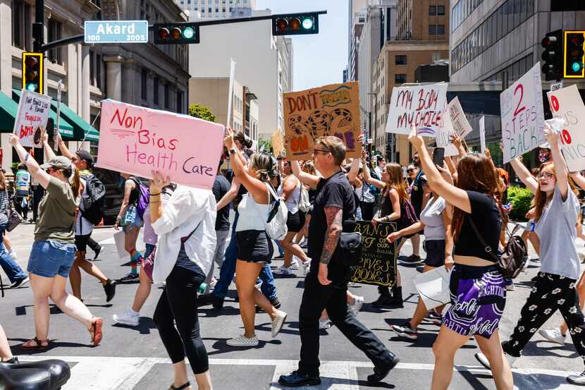 Abortion rights supporters march in downtown Dallas on Wednesday, June 29, 2022.