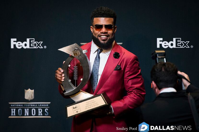 Dallas Cowboys running back Ezekiel Elliott poses with the FedEx Air & Ground Award at the...