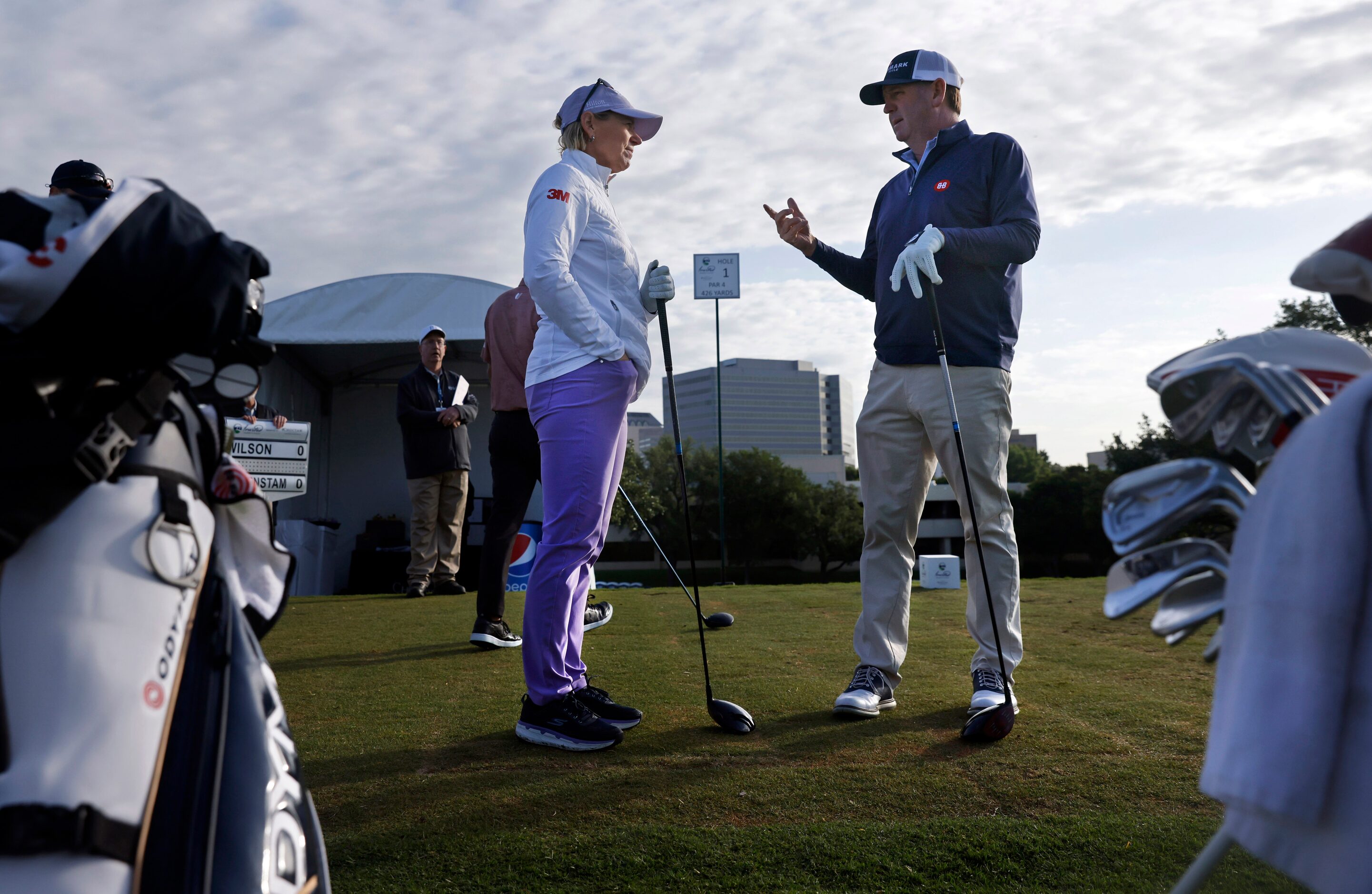 Retired LPGA golfer Annika Sorenstam (left) visits with playing partner Harrison Frazier...