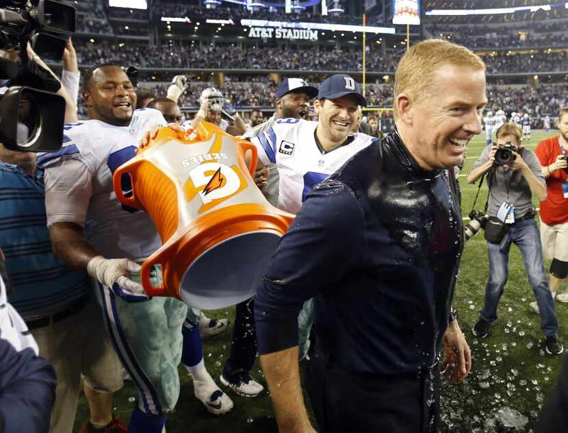 Dallas Cowboys head coach Jason Garrett is all laughs after getting dunked with sports drink...