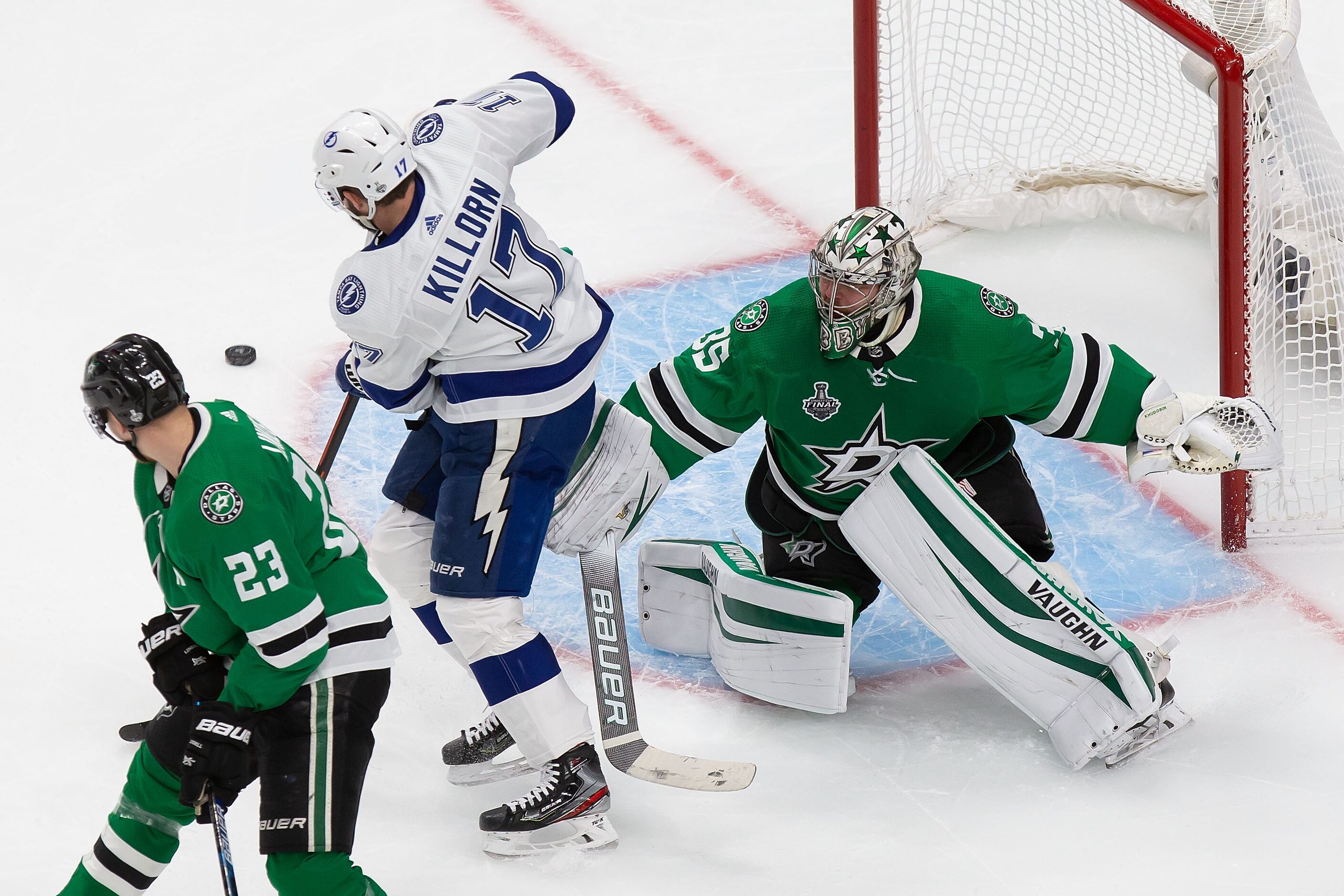 Esa Lindell (23) and goaltender Anton Khudobin (35) of the Dallas Stars defend against Alex...